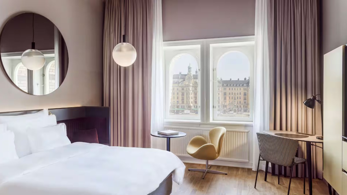 Guest bedroom at Radisson Collection Strand Hotel