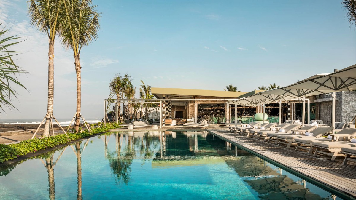 Outdoor swimming pool at Como Uma Canggu