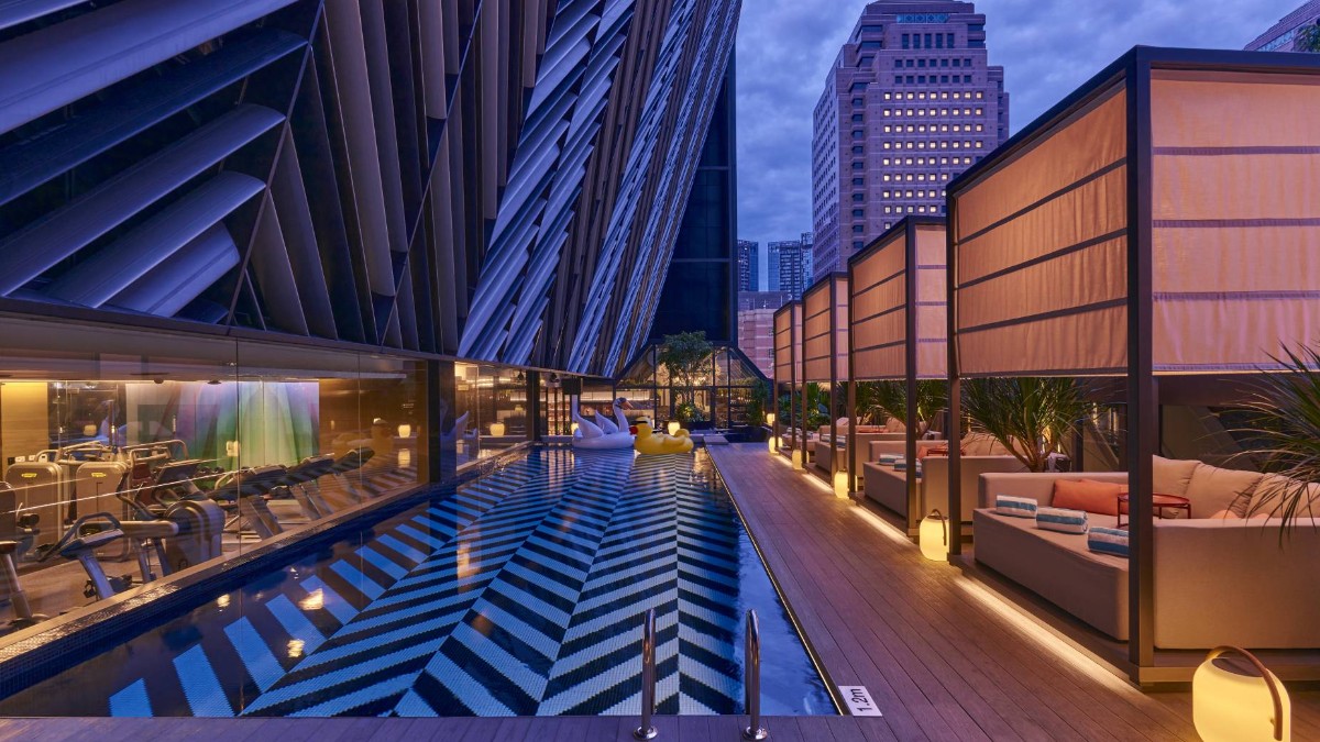 Outdoor swimming pool at Pullman Singapore Orchard