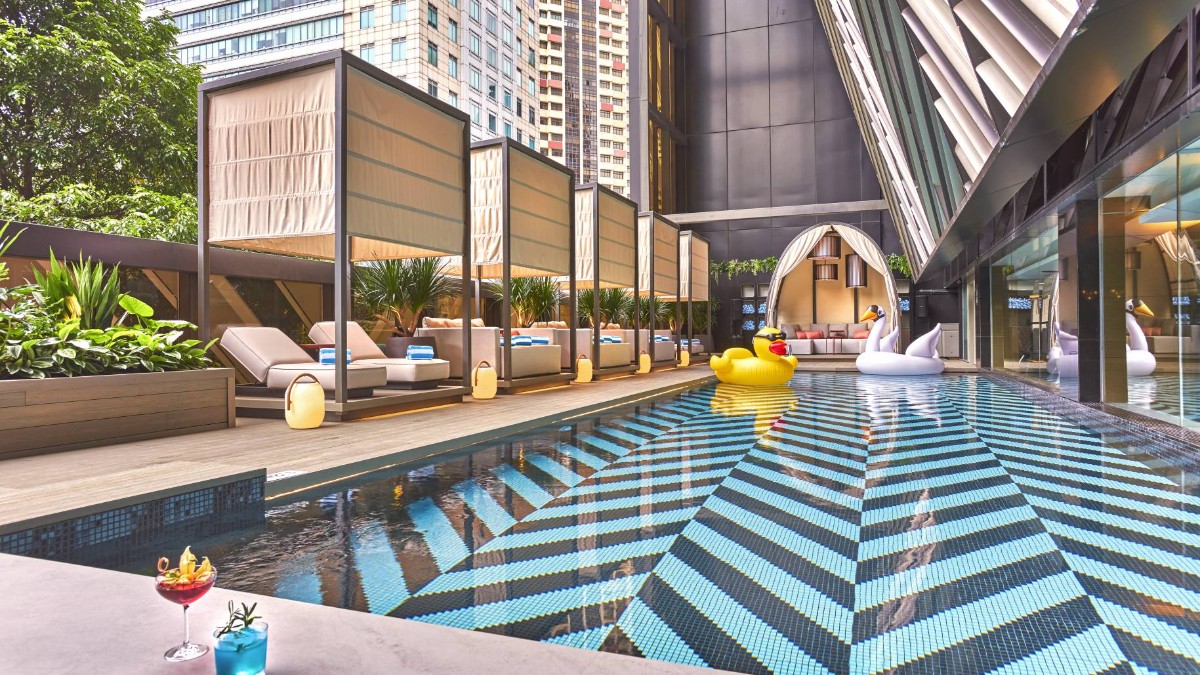 Outdoor swimming pool at Pullman Singapore Orchard