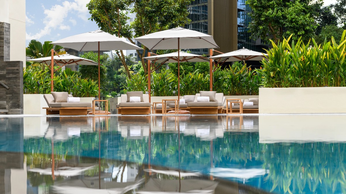 Outdoor swimming pool at Conrad Singapore Orchard