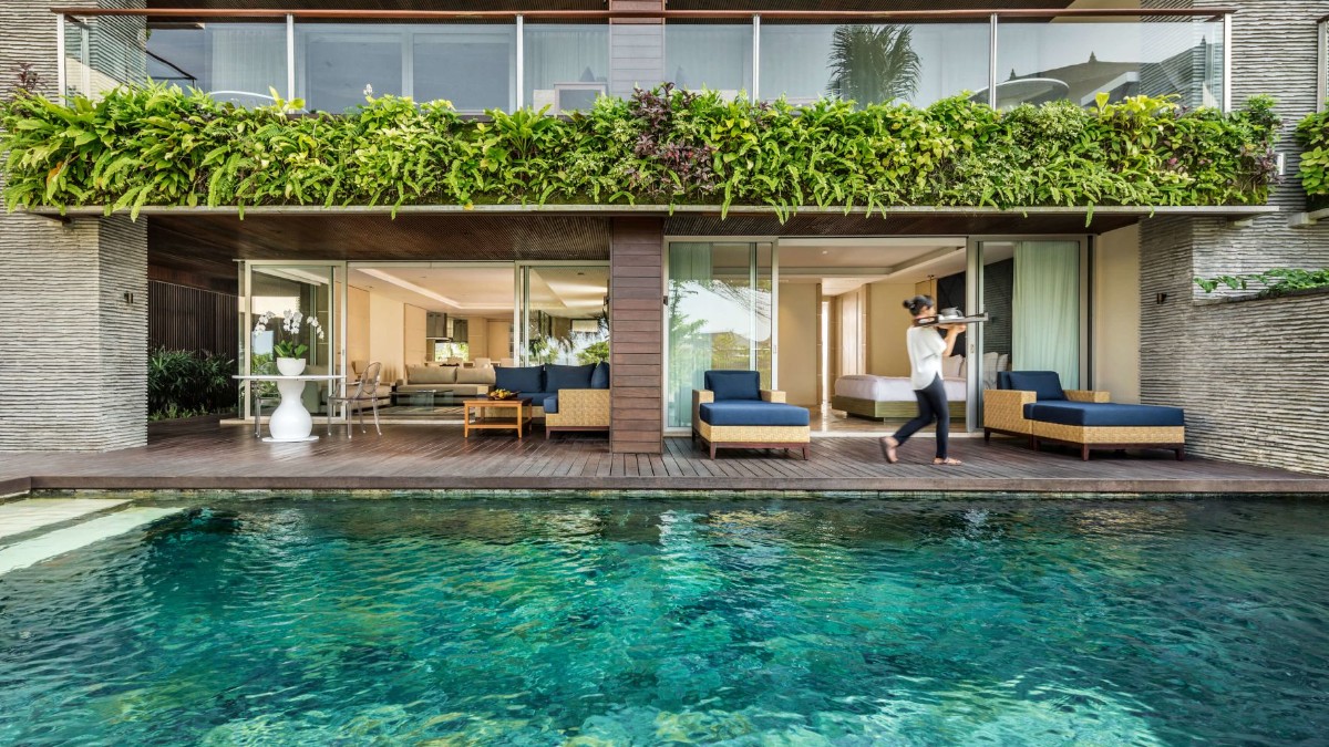 Outdoor swimming pool at Como Uma Canggu