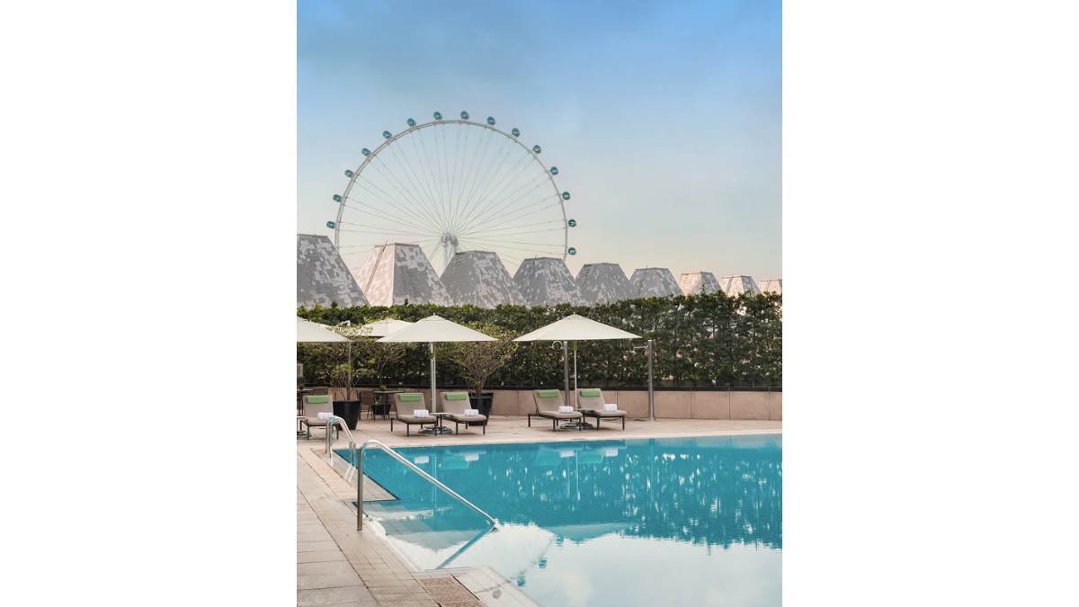 Outdoor swimming pool at Hotel Conrad Singapore Marina Bay