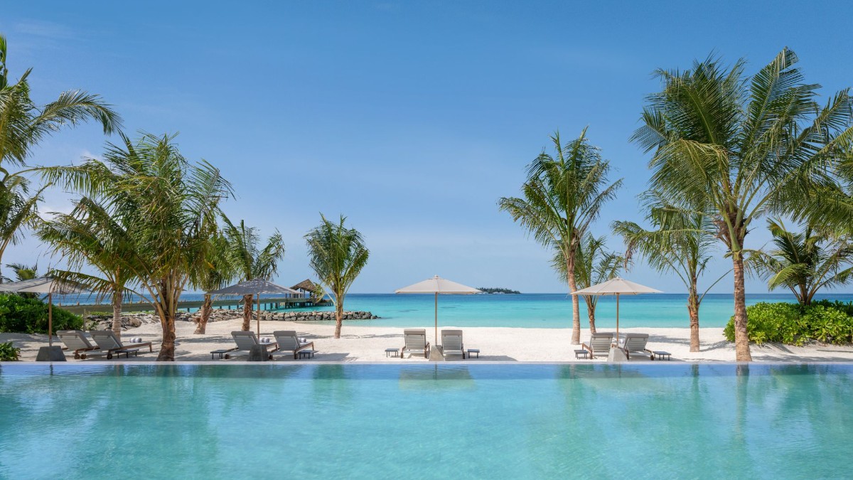 Outdoor swiiming pool at JW Marriott Maldives Kaafu Atoll Island Resort