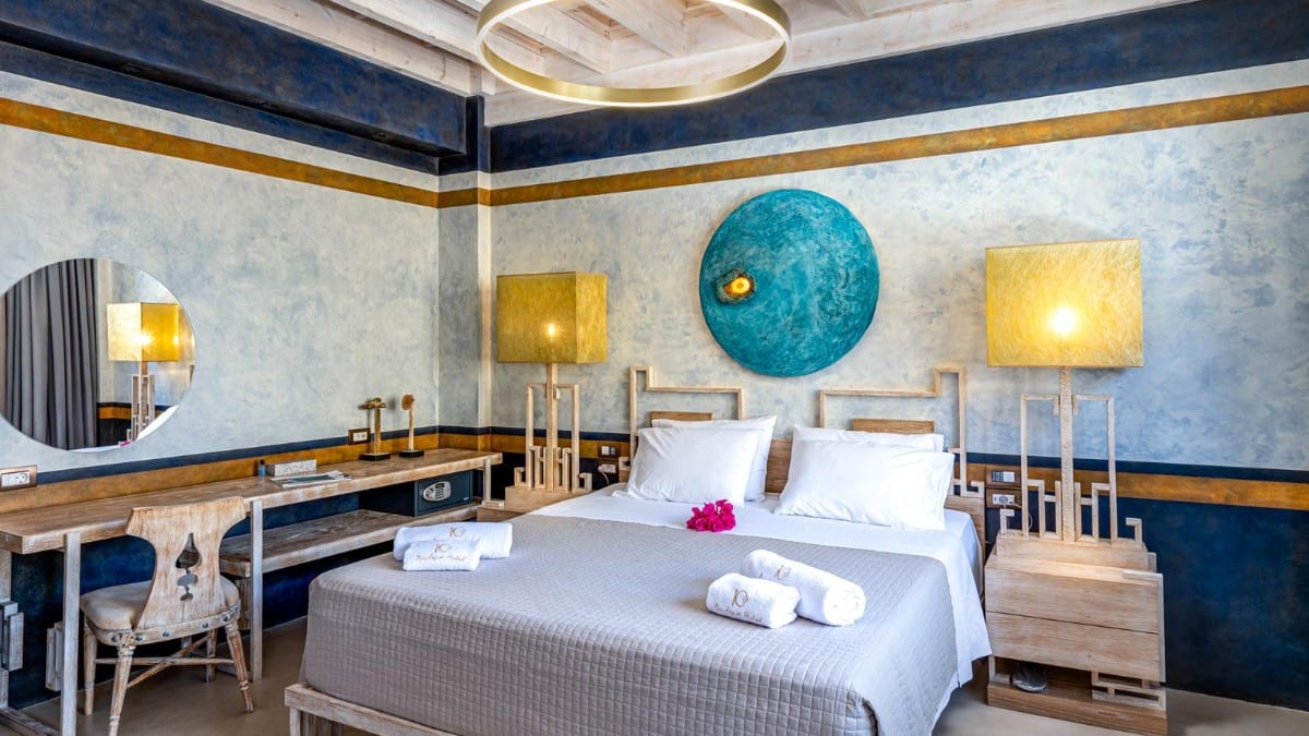 Schlafzimmer im 10GR Boutique Hotel & Wine Bar