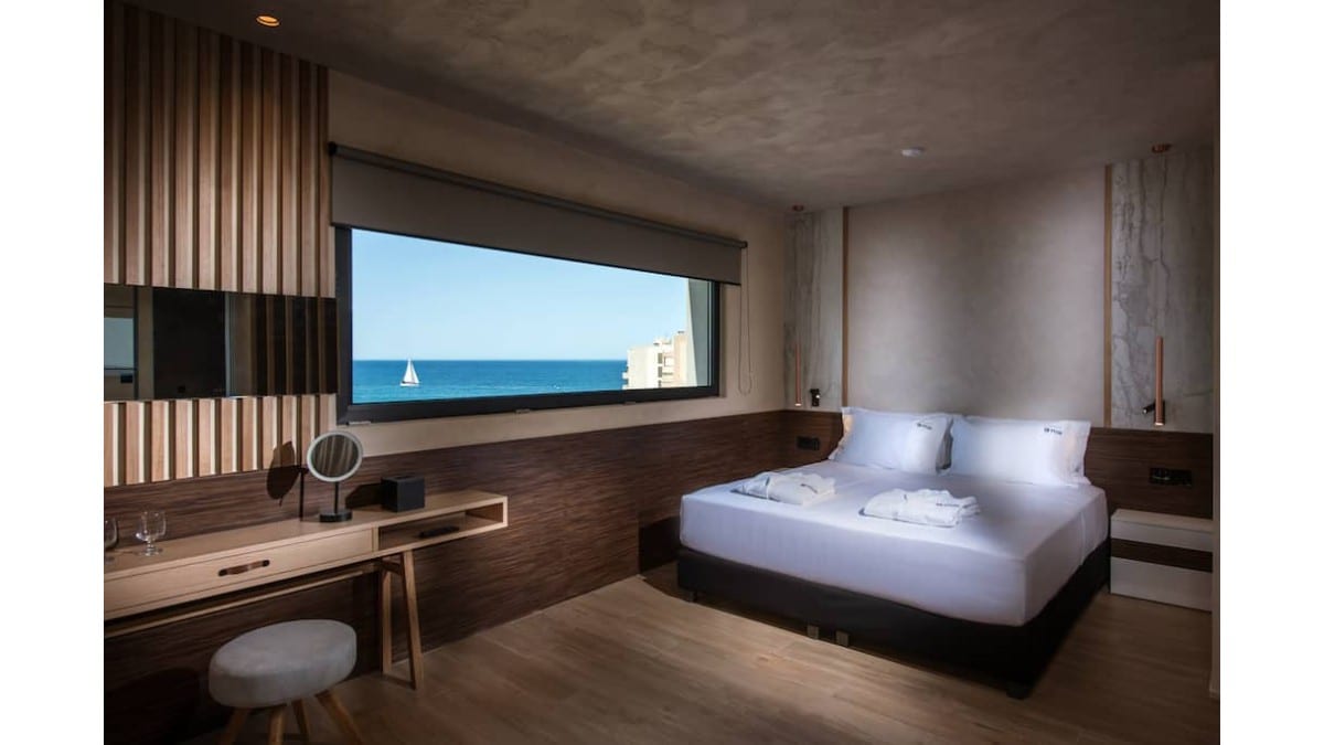 Schlafzimmer im Chania Flair Boutique Hotel Tapestry Collection by Hilton