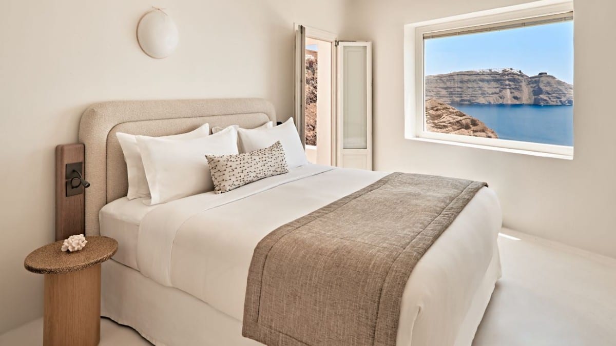 Bedroom at Mystique, a Luxury Collection Hotel, Santorini
