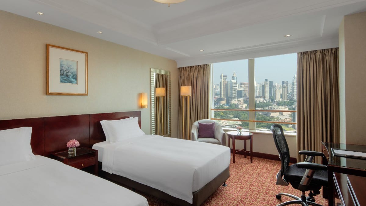 Bedroom at Radisson Blu Hotel Shanghai New World