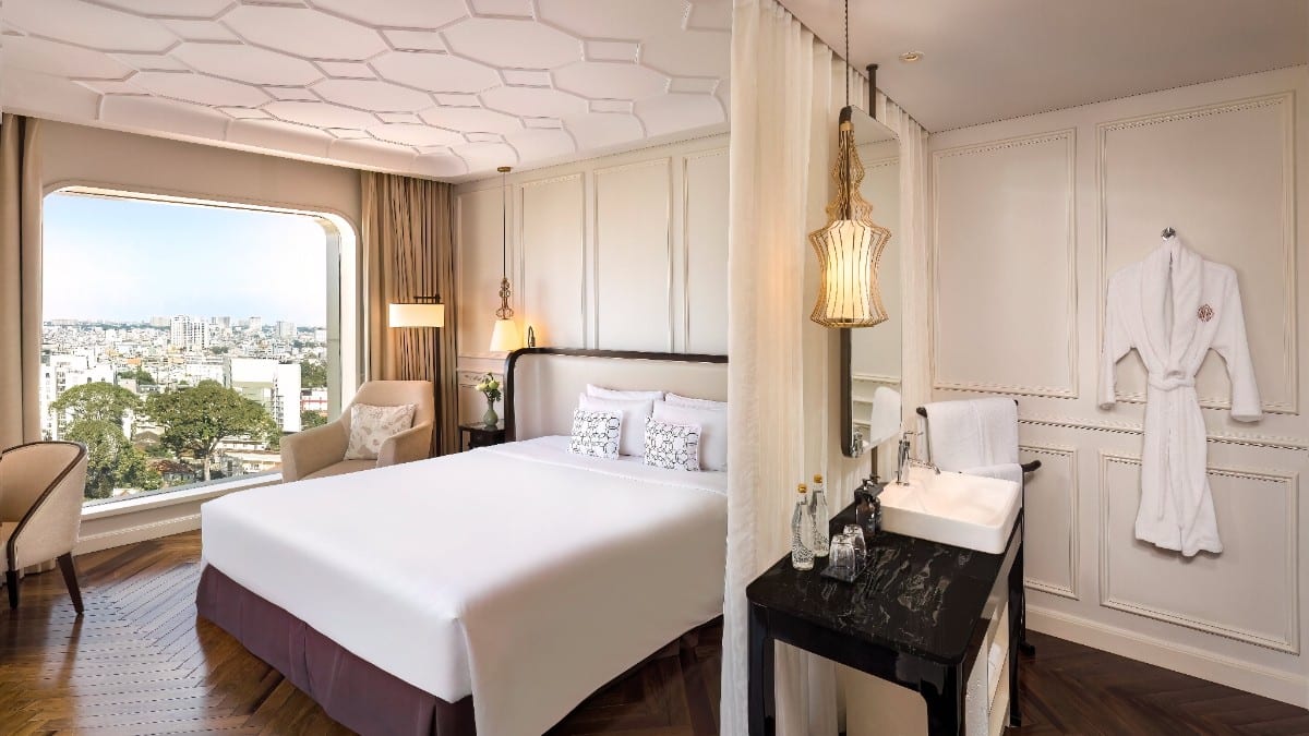Bedroom at Hotel des Arts Saigon Mgallery Collection