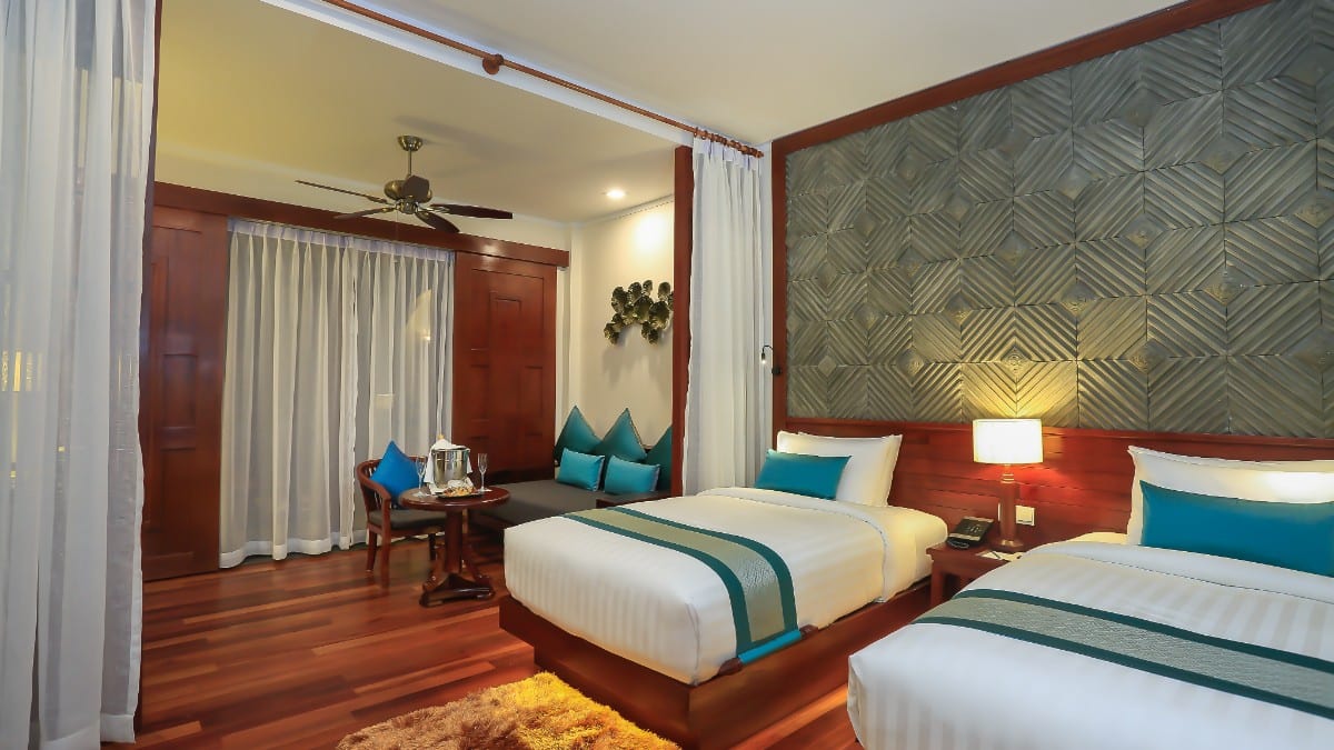 Bedroom at Lotus Blanc Hotel